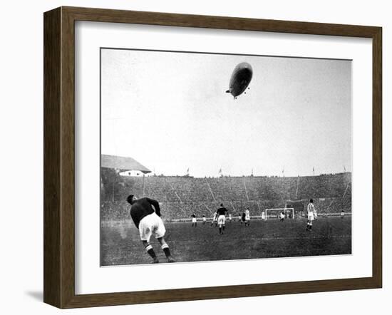 The 'Graf Zeppelin' over Wembley During the F.A. Cup Final-null-Framed Photographic Print