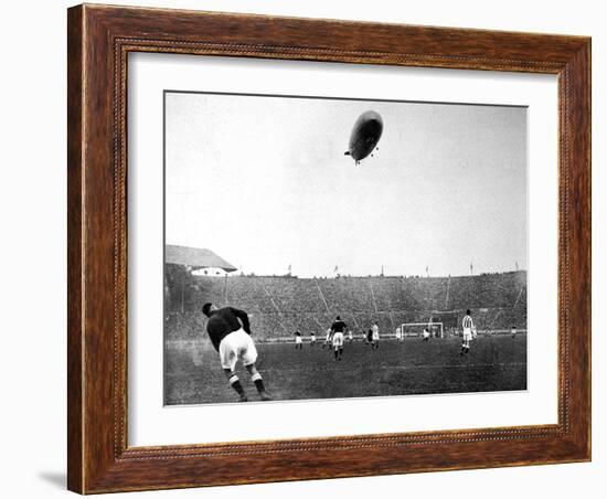 The 'Graf Zeppelin' over Wembley During the F.A. Cup Final-null-Framed Photographic Print