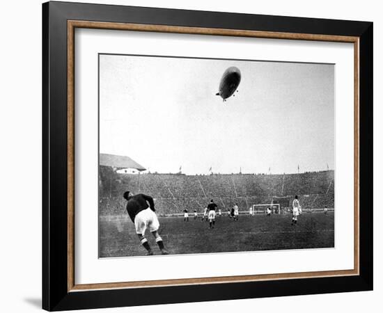 The 'Graf Zeppelin' over Wembley During the F.A. Cup Final-null-Framed Photographic Print