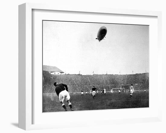 The 'Graf Zeppelin' over Wembley During the F.A. Cup Final-null-Framed Photographic Print