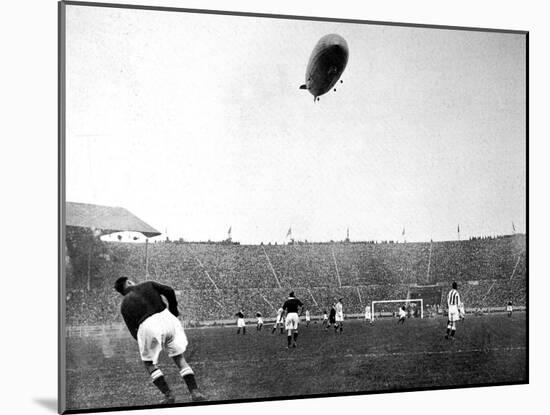 The 'Graf Zeppelin' over Wembley During the F.A. Cup Final-null-Mounted Photographic Print