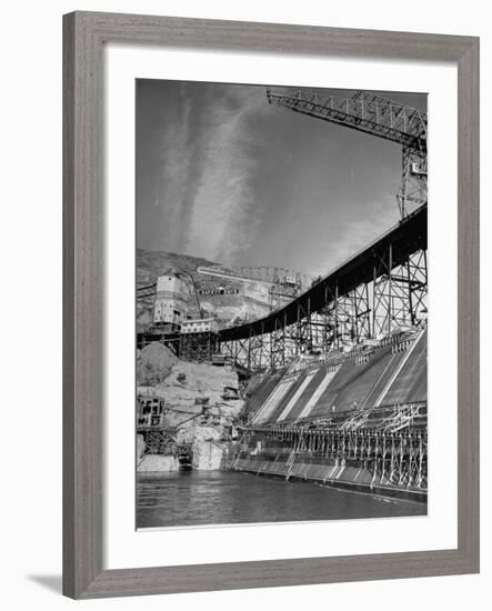 The Grand Coulee Dam under Construction with a Sign in the Bkgrd. That Says: "Safety Pays"-Alfred Eisenstaedt-Framed Premium Photographic Print