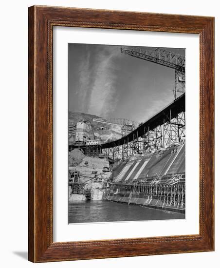 The Grand Coulee Dam under Construction with a Sign in the Bkgrd. That Says: "Safety Pays"-Alfred Eisenstaedt-Framed Photographic Print