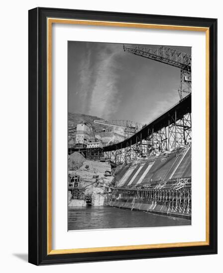 The Grand Coulee Dam under Construction with a Sign in the Bkgrd. That Says: "Safety Pays"-Alfred Eisenstaedt-Framed Photographic Print