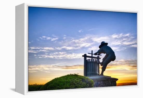 The Grape Crusher Statue agains Dramatic Sky, Napa Valley, California-George Oze-Framed Premier Image Canvas