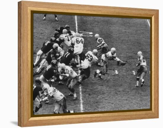 The Green Bay Packers Playing a Game-George Silk-Framed Premier Image Canvas