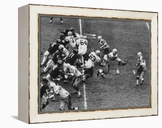 The Green Bay Packers Playing a Game-George Silk-Framed Premier Image Canvas