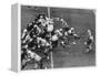 The Green Bay Packers Playing a Game-George Silk-Framed Premier Image Canvas