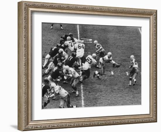 The Green Bay Packers Playing a Game-George Silk-Framed Premium Photographic Print