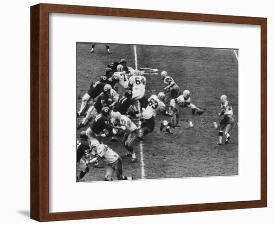 The Green Bay Packers Playing a Game-George Silk-Framed Premium Photographic Print