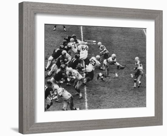 The Green Bay Packers Playing a Game-George Silk-Framed Premium Photographic Print