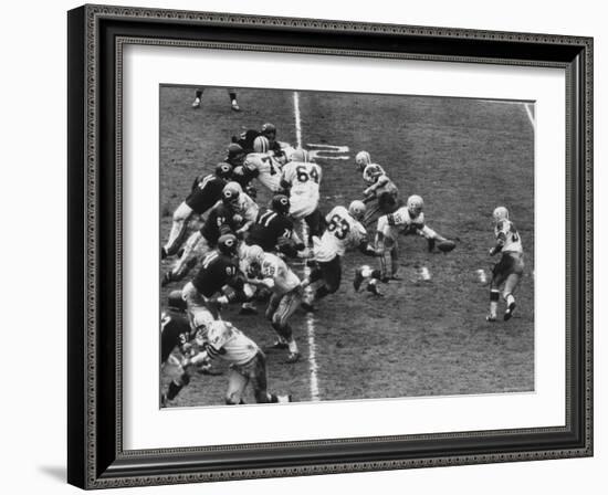 The Green Bay Packers Playing a Game-George Silk-Framed Premium Photographic Print