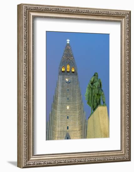 The Hallgrims Church with a statue of Leif Erikson in the foreground lit up at night, Reykjavik, Ic-Miles Ertman-Framed Photographic Print