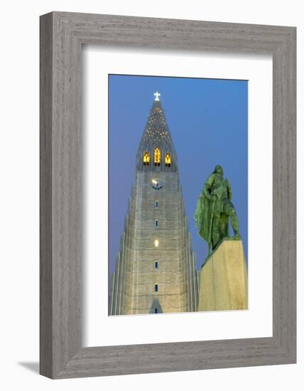 The Hallgrims Church with a statue of Leif Erikson in the foreground lit up at night, Reykjavik, Ic-Miles Ertman-Framed Photographic Print