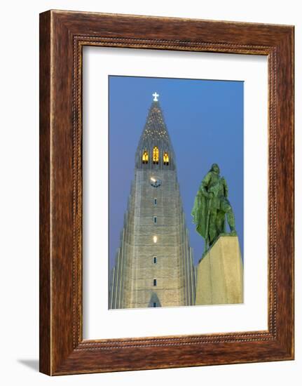 The Hallgrims Church with a statue of Leif Erikson in the foreground lit up at night, Reykjavik, Ic-Miles Ertman-Framed Photographic Print