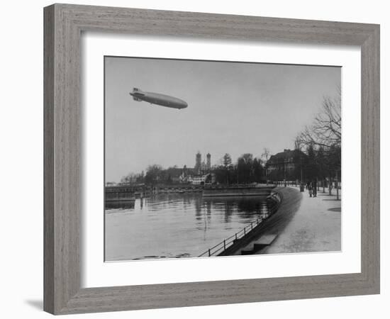 The Hindenburg Airship of Zeppelin Design Flying over City Where it was Fabricated-null-Framed Photographic Print