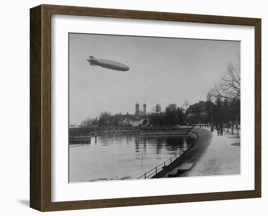 The Hindenburg Airship of Zeppelin Design Flying over City Where it was Fabricated-null-Framed Photographic Print