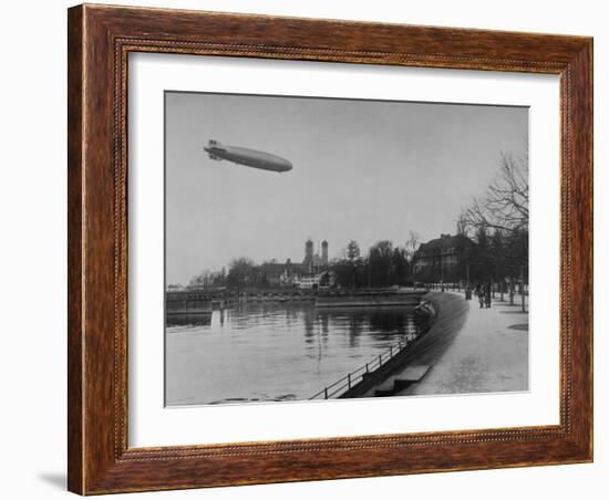 The Hindenburg Airship of Zeppelin Design Flying over City Where it was Fabricated-null-Framed Photographic Print