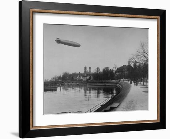 The Hindenburg Airship of Zeppelin Design Flying over City Where it was Fabricated-null-Framed Photographic Print