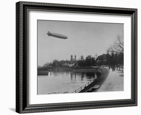 The Hindenburg Airship of Zeppelin Design Flying over City Where it was Fabricated-null-Framed Photographic Print