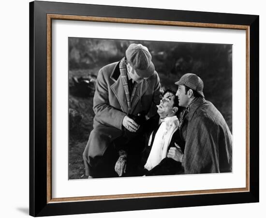 THE HOUND OF THE BASKERVILLES, 1939 directed by SIDNEY LANFIELD. Nigel Bruce, Richard Greene and Ba-null-Framed Photo