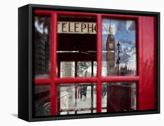 The houses of parliament reflected in an iconic red phone box in Westminster, London.-Alex Saberi-Framed Premier Image Canvas