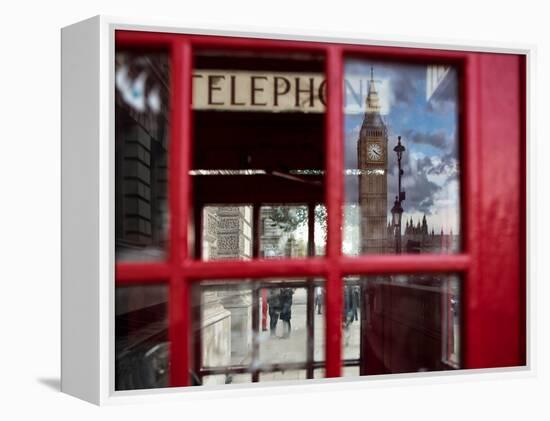 The houses of parliament reflected in an iconic red phone box in Westminster, London.-Alex Saberi-Framed Premier Image Canvas