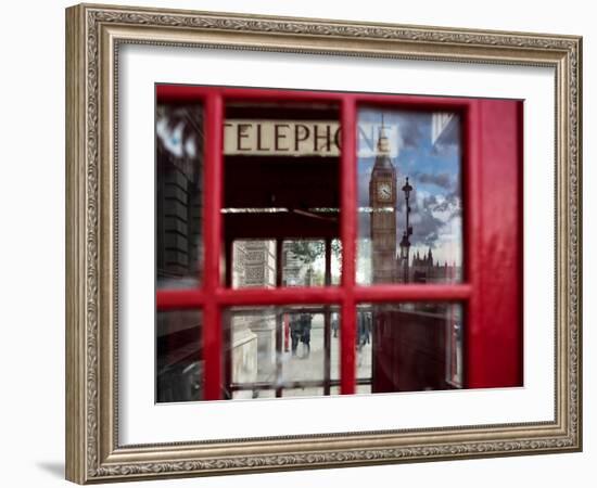 The houses of parliament reflected in an iconic red phone box in Westminster, London.-Alex Saberi-Framed Photographic Print