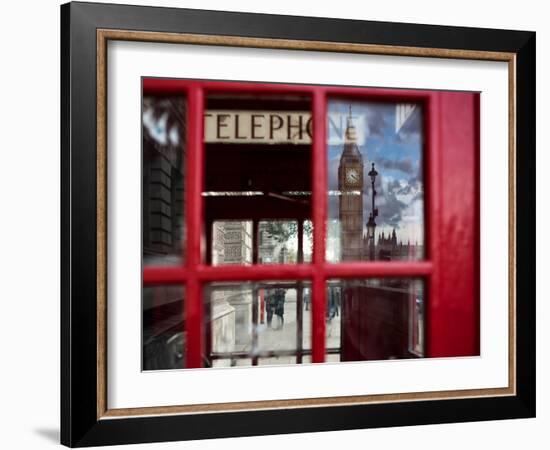 The houses of parliament reflected in an iconic red phone box in Westminster, London.-Alex Saberi-Framed Photographic Print