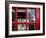 The houses of parliament reflected in an iconic red phone box in Westminster, London.-Alex Saberi-Framed Photographic Print