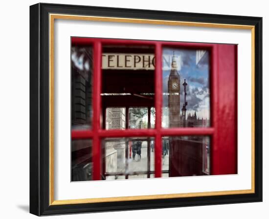 The houses of parliament reflected in an iconic red phone box in Westminster, London.-Alex Saberi-Framed Photographic Print