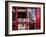 The houses of parliament reflected in an iconic red phone box in Westminster, London.-Alex Saberi-Framed Photographic Print