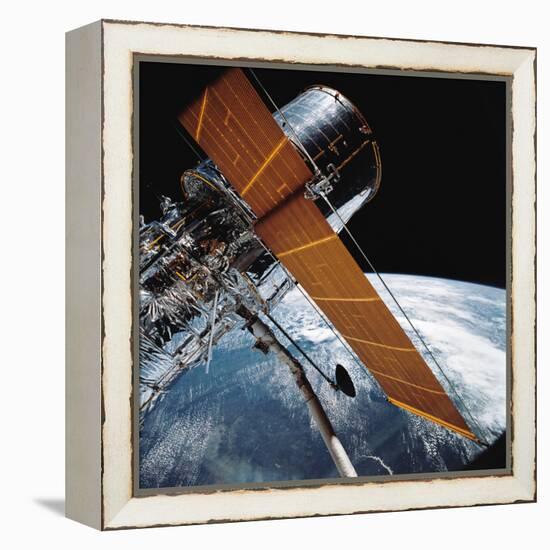 The Hubble Space Telescope Backdropped by Planet Earth-null-Framed Premier Image Canvas