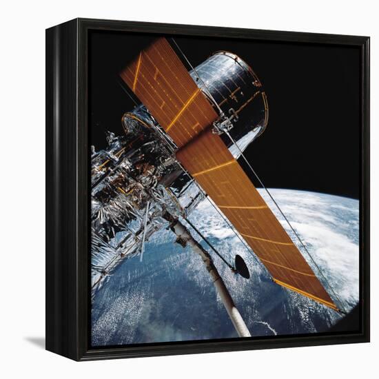 The Hubble Space Telescope Backdropped by Planet Earth-null-Framed Premier Image Canvas