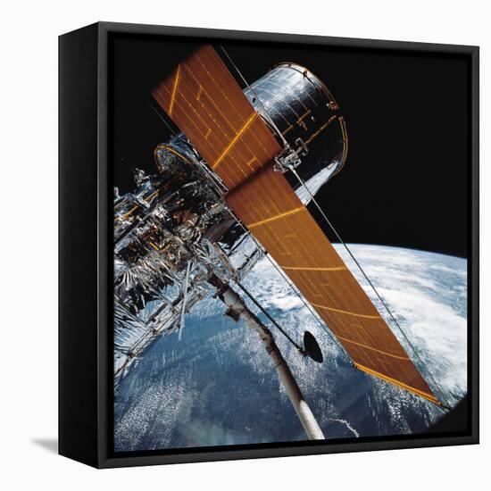 The Hubble Space Telescope Backdropped by Planet Earth-null-Framed Premier Image Canvas