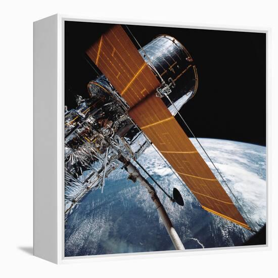 The Hubble Space Telescope Backdropped by Planet Earth-null-Framed Premier Image Canvas