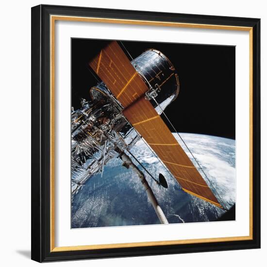 The Hubble Space Telescope Backdropped by Planet Earth-null-Framed Photographic Print