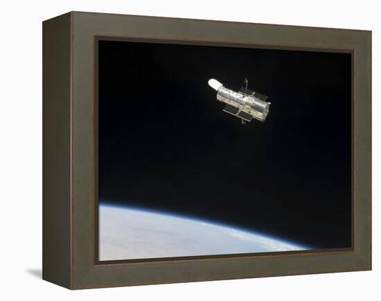 The Hubble Space Telescope in Orbit Above Earth-null-Framed Premier Image Canvas