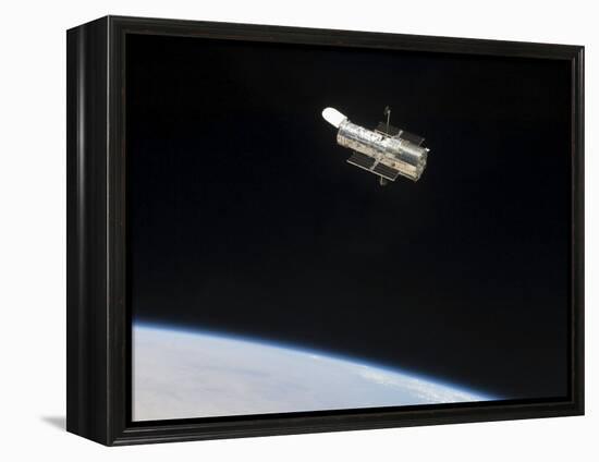 The Hubble Space Telescope in Orbit Above Earth-null-Framed Premier Image Canvas