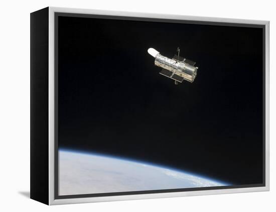 The Hubble Space Telescope in Orbit Above Earth-null-Framed Premier Image Canvas