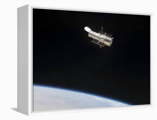 The Hubble Space Telescope in Orbit Above Earth-null-Framed Premier Image Canvas