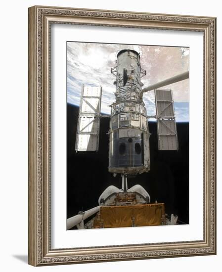 The Hubble Space Telescope Is Released from the Cargo Bay of Space Shuttle Atlantis-null-Framed Photographic Print