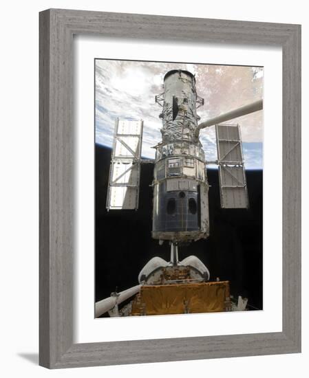 The Hubble Space Telescope Is Released from the Cargo Bay of Space Shuttle Atlantis-null-Framed Photographic Print