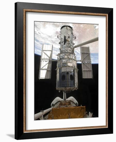 The Hubble Space Telescope Is Released from the Cargo Bay of Space Shuttle Atlantis-null-Framed Photographic Print