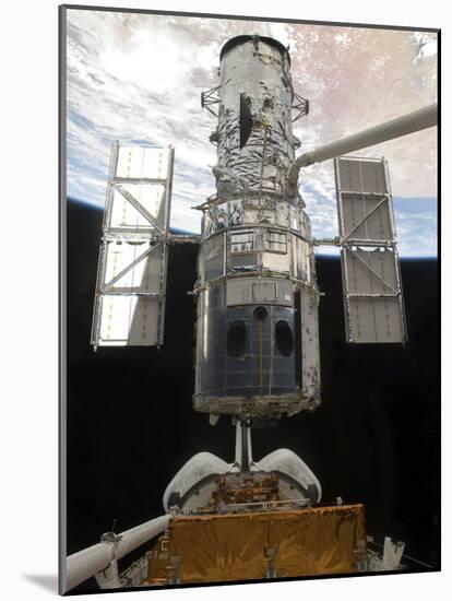 The Hubble Space Telescope Is Released from the Cargo Bay of Space Shuttle Atlantis-null-Mounted Photographic Print