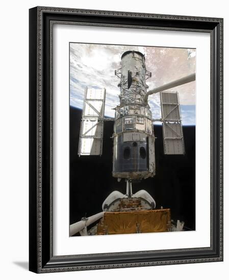 The Hubble Space Telescope Is Released from the Cargo Bay of Space Shuttle Atlantis-null-Framed Photographic Print