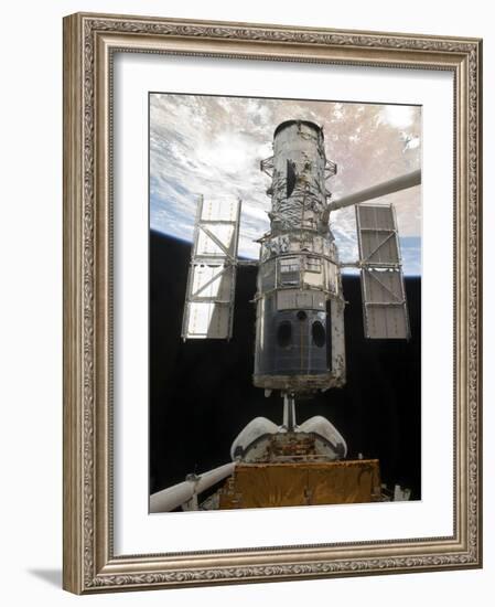 The Hubble Space Telescope Is Released from the Cargo Bay of Space Shuttle Atlantis-null-Framed Photographic Print