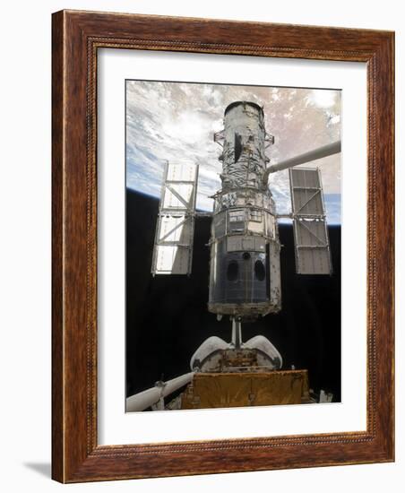 The Hubble Space Telescope Is Released from the Cargo Bay of Space Shuttle Atlantis-null-Framed Photographic Print