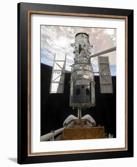 The Hubble Space Telescope Is Released from the Cargo Bay of Space Shuttle Atlantis-null-Framed Photographic Print