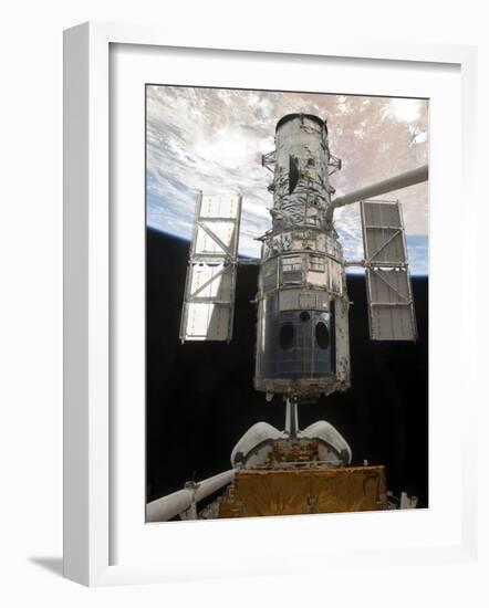 The Hubble Space Telescope Is Released from the Cargo Bay of Space Shuttle Atlantis-null-Framed Photographic Print